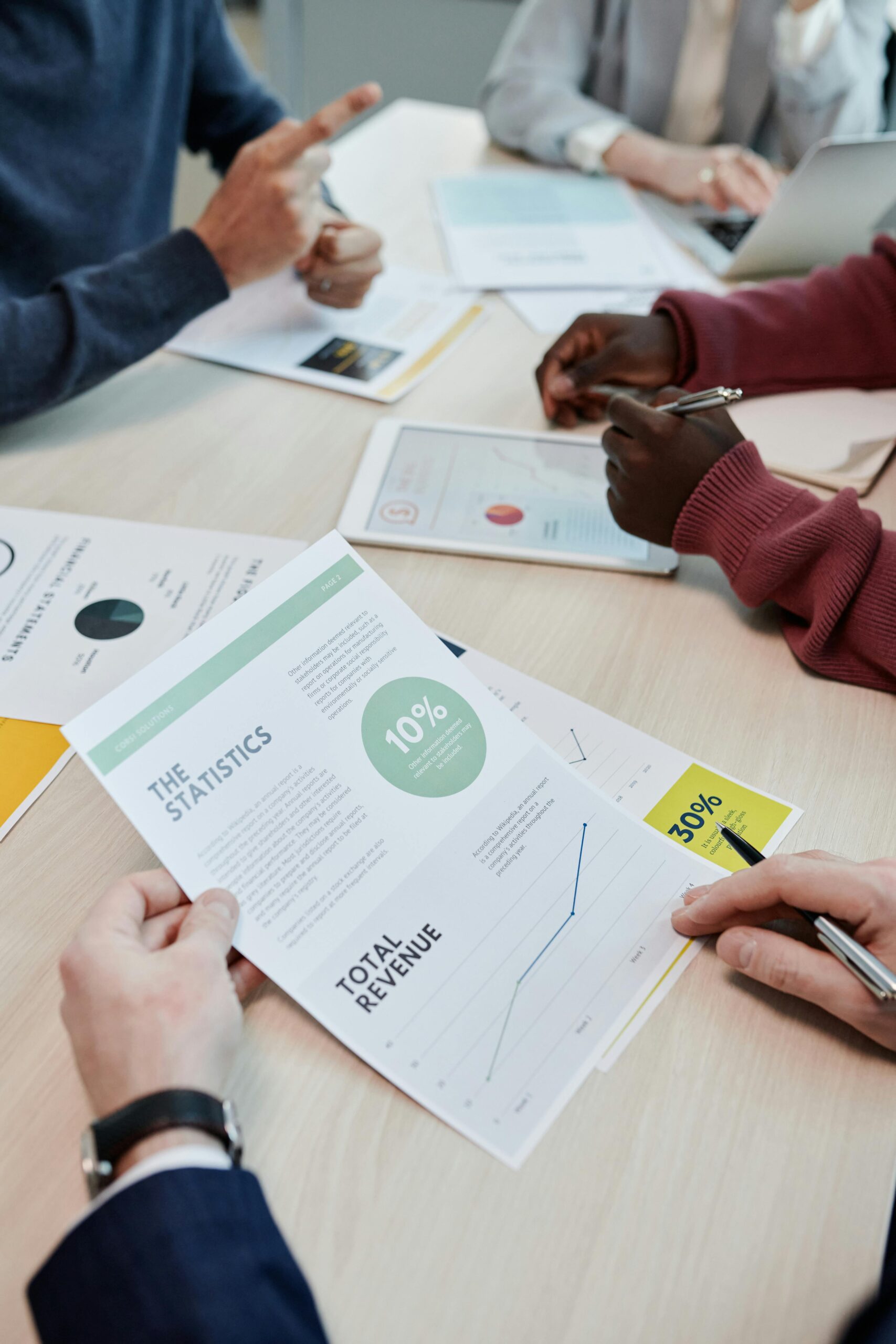 Flat lay of colorful office supplies and sticky notes labeled 'Expenses' and 'Receipts'.